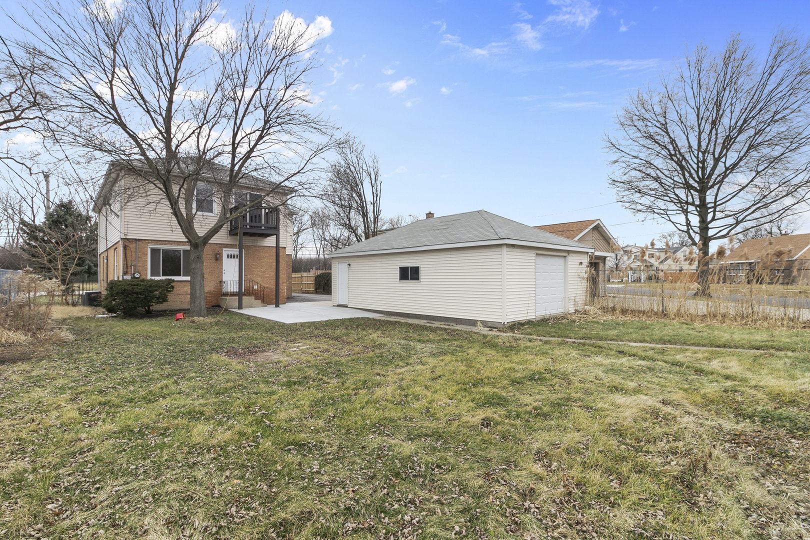 6837 Roberts Road Bridgeview, IL 60455 - Photo 21 of 22 a view of a house with a yard