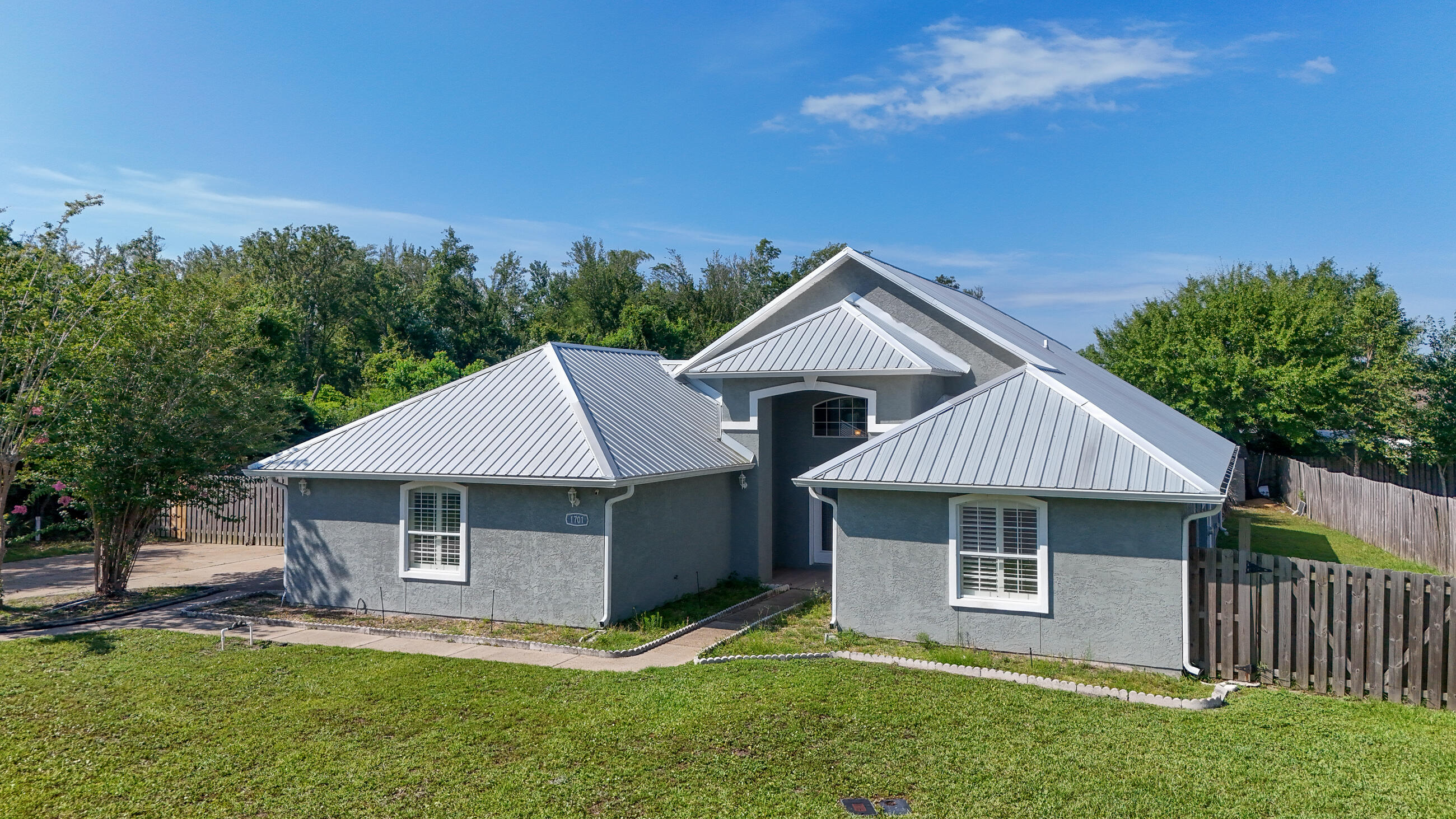 1701 Sutherland Road Lynn Haven, FL 32444 - Photo 3 of 48 DJI_20240918192948_0001_D