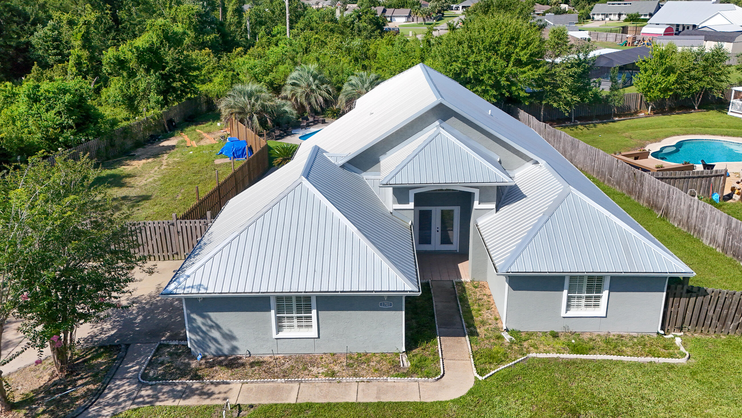 1701 Sutherland Road Lynn Haven, FL 32444 - Photo 4 of 48 DJI_20240918192959_0003_D