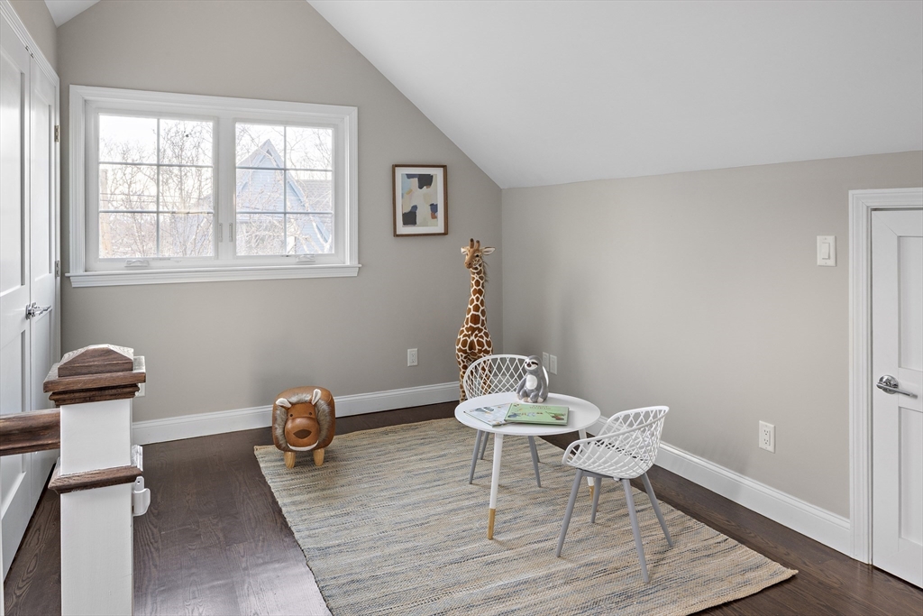 12 Madison Street, Unit 2 Somerville, MA 02143 - Photo 11 of 24 a dining room with furniture and wooden floor