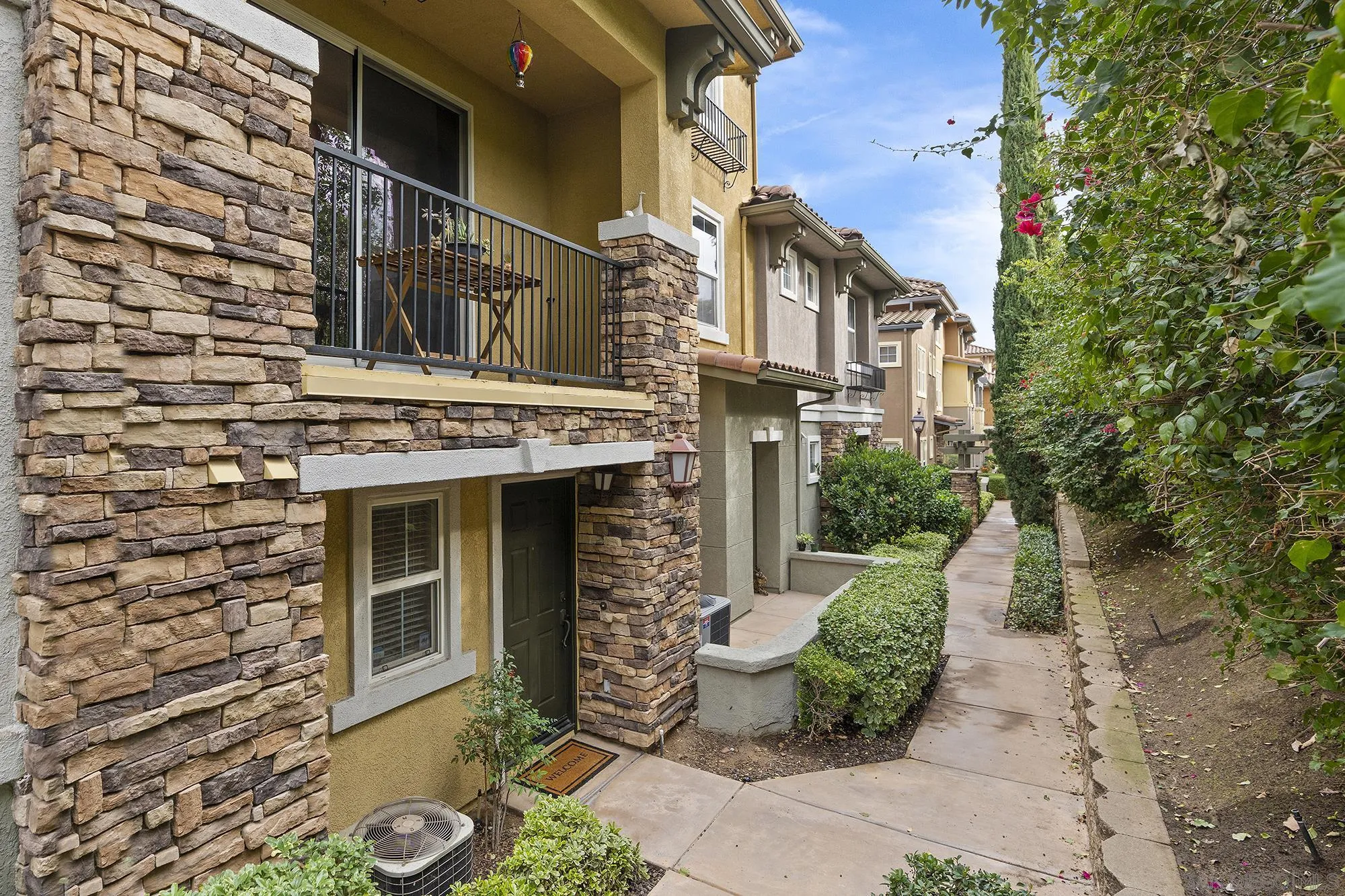 156 Via Montisi Santee, CA 92071 - Photo 6 of 25 a front view of a house with a yard