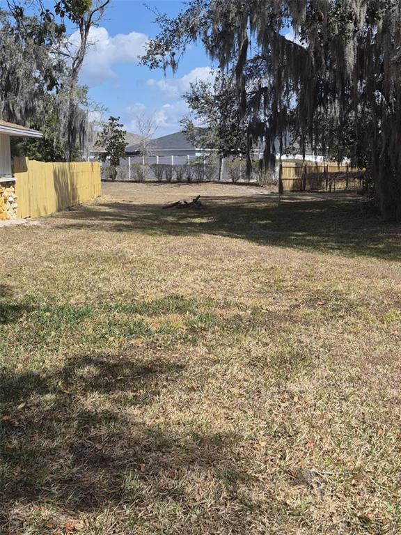 10012 Lake Louisa Road Clermont, FL 34711 - Photo 16 of 25 a view of a yard with a house