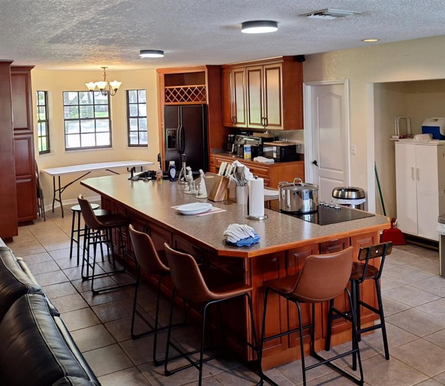 10012 Lake Louisa Road Clermont, FL 34711 - Photo 4 of 25 a dining room with furniture and window