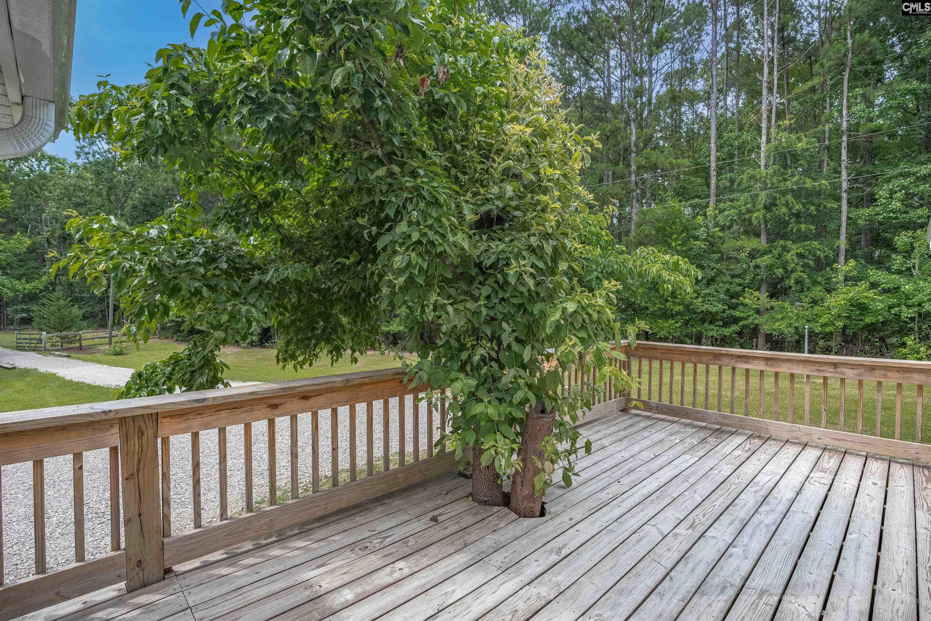 304 Cooper Road Blythewood, SC 29016 - Photo 29 of 29 a view of balcony with wooden floor and fence