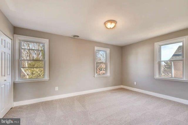 4621 Rokeby Road Baltimore, MD 21229 - Photo 14 of 28 an empty room with windows