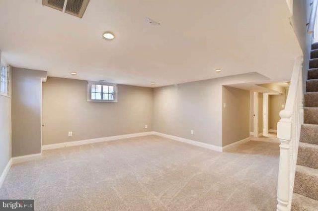 4621 Rokeby Road Baltimore, MD 21229 - Photo 18 of 28 a view of an empty room with a window