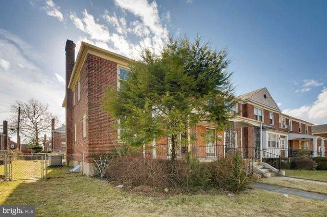 4621 Rokeby Road Baltimore, MD 21229 - Photo 3 of 28 a front view of a house with a yard