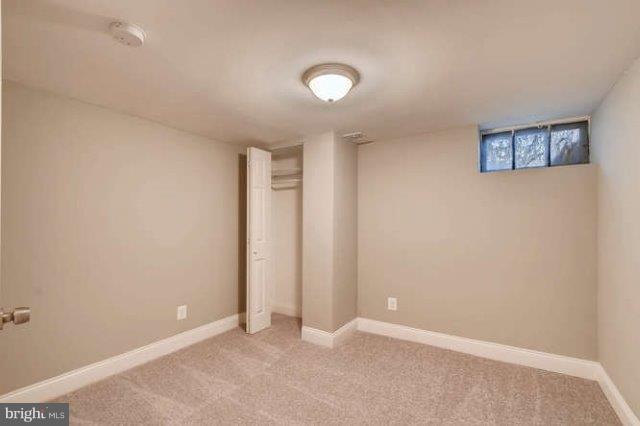 4621 Rokeby Road Baltimore, MD 21229 - Photo 23 of 28 an empty room with a workbench