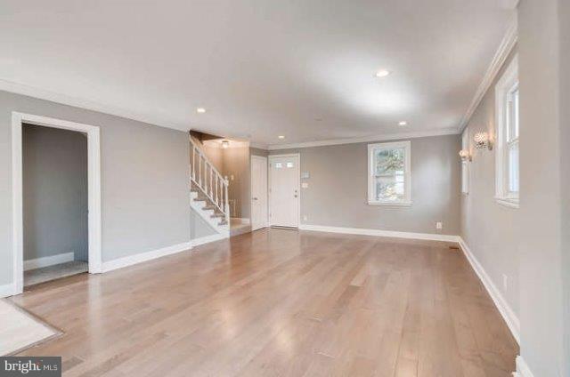 4621 Rokeby Road Baltimore, MD 21229 - Photo 6 of 28 a view of an empty room with a window