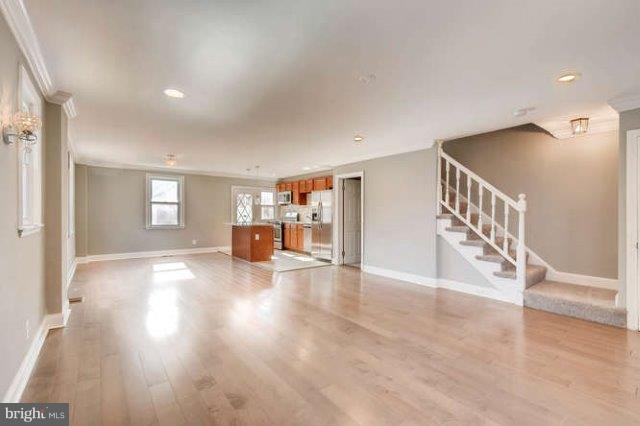 4621 Rokeby Road Baltimore, MD 21229 - Photo 7 of 28 a view of empty room with wooden floor
