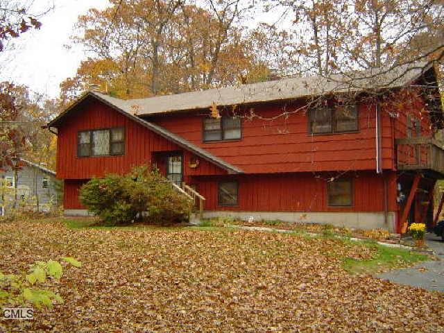 88 Fox Road Trumbull, CT 06611 - Photo 1 of 1 a view of a house with a yard