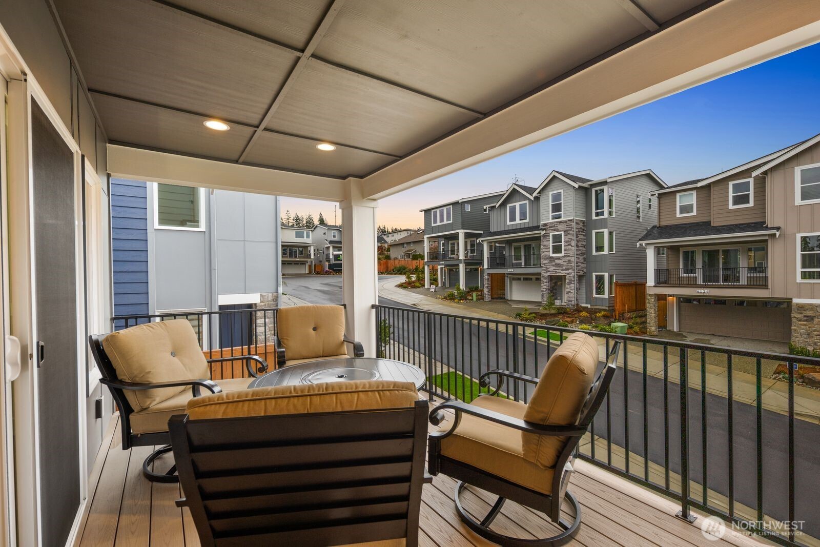 4123 220th Place Southeast Bothell, WA 98021 - Photo 25 of 25 a view of a patio with couches chairs and wooden floor