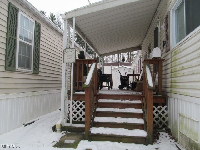 9735 Chillicothe Road, Unit 2 Willoughby, OH 44094 - Photo 8 of 49 View of snow covered deck