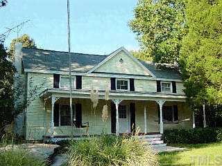 208 Mt Vernon Church Road Raleigh, NC 27614 - Photo 1 of 1 a front view of a house with garden