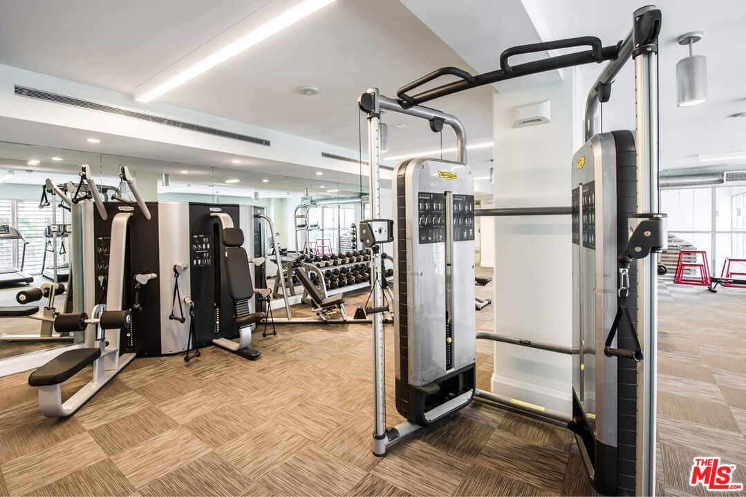 12760 Millennium Drive, Unit NB107 Los Angeles, CA 90094 - Photo 10 of 38 a view of a room with gym equipment
