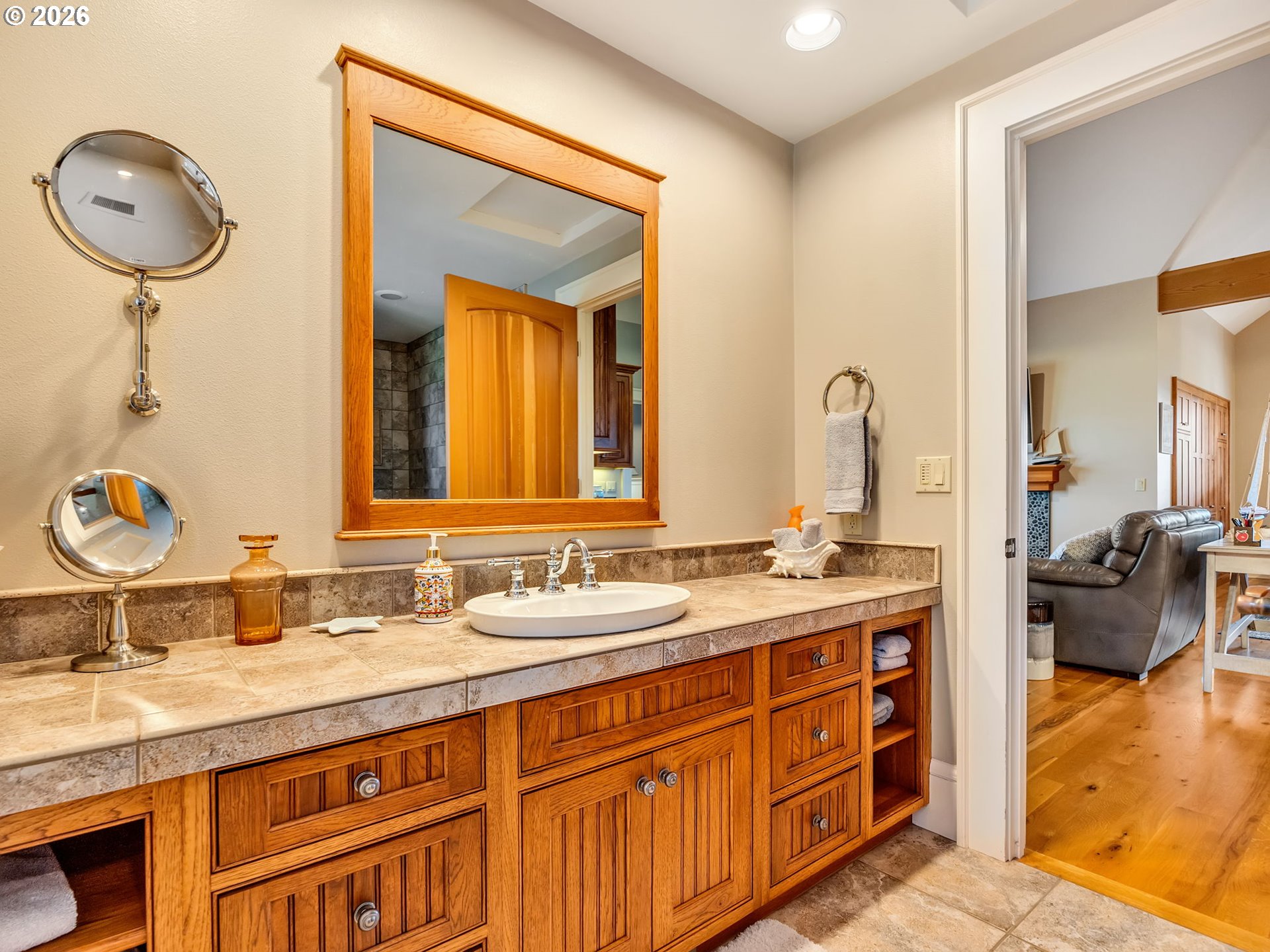 89079 Pinehurst Road Warrenton, OR 97146 - Photo 42 of 46 a bathroom with a double vanity sink and a mirror