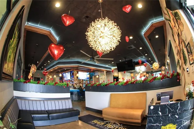 a view of a chairs and table in a patio