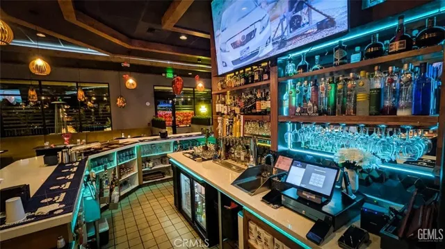 a living room with lots of furniture and a clock