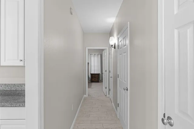 a bedroom with a bed and a ceiling fan