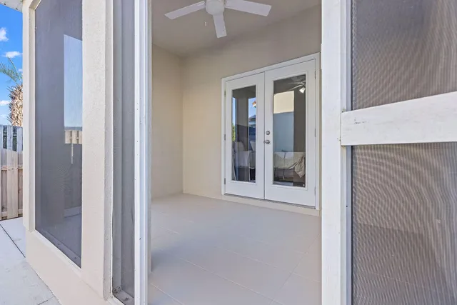a spacious bathroom with a double vanity sink and a mirror