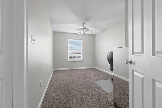 a bathroom with a double vanity sink and mirror
