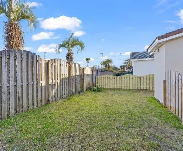 a view of a swimming pool with a lounge chairs