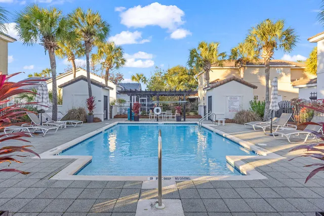 an aerial view of a house with a outdoor space