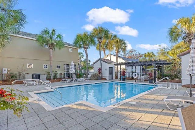 an aerial view of a house with a garden