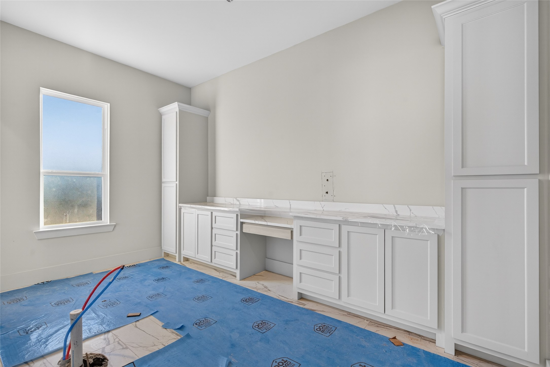 24921 Hopeview Way Montgomery, TX 77356 - Photo 10 of 13 a kitchen with white cabinets and wooden floor