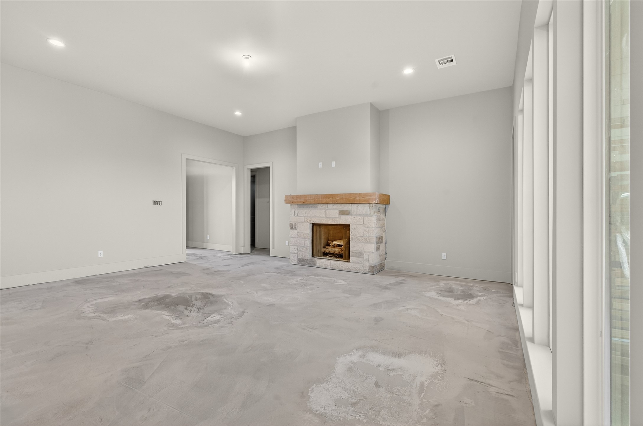 24921 Hopeview Way Montgomery, TX 77356 - Photo 11 of 13 a view of an empty room with a fireplace