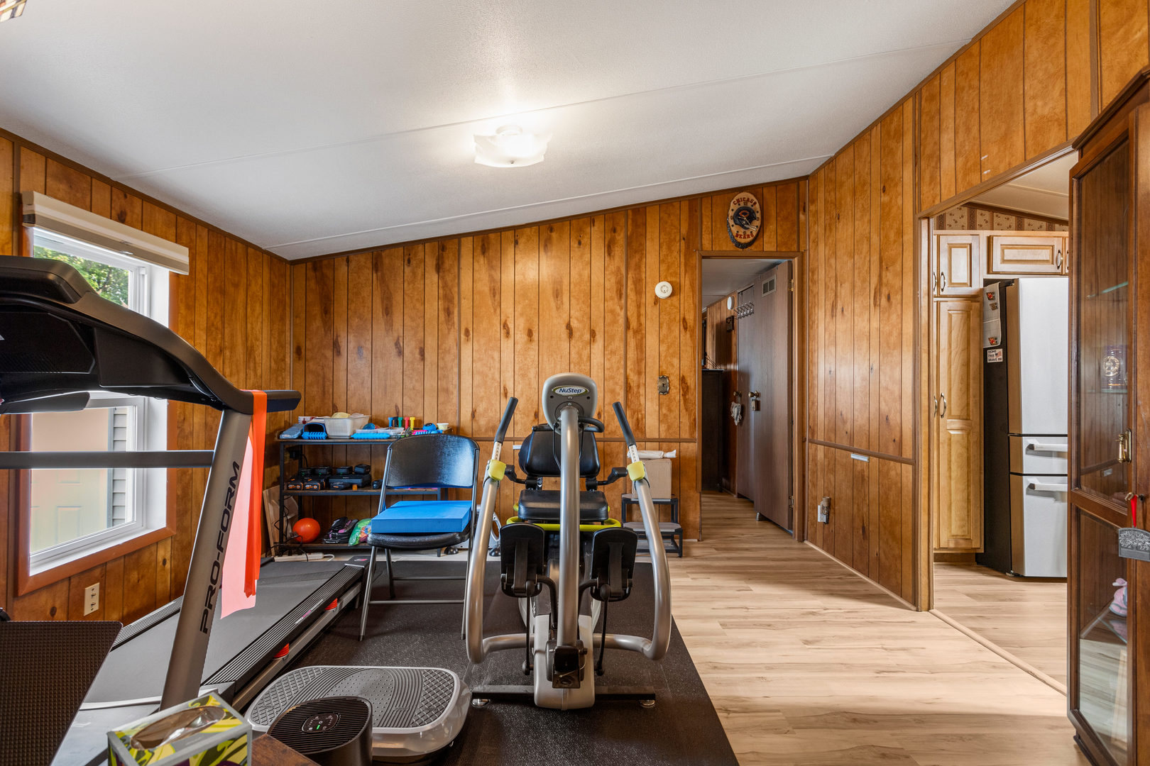 628 Williamson Street Mahomet, IL 61853 - Photo 16 of 36 a dining room with furniture and a chandelier