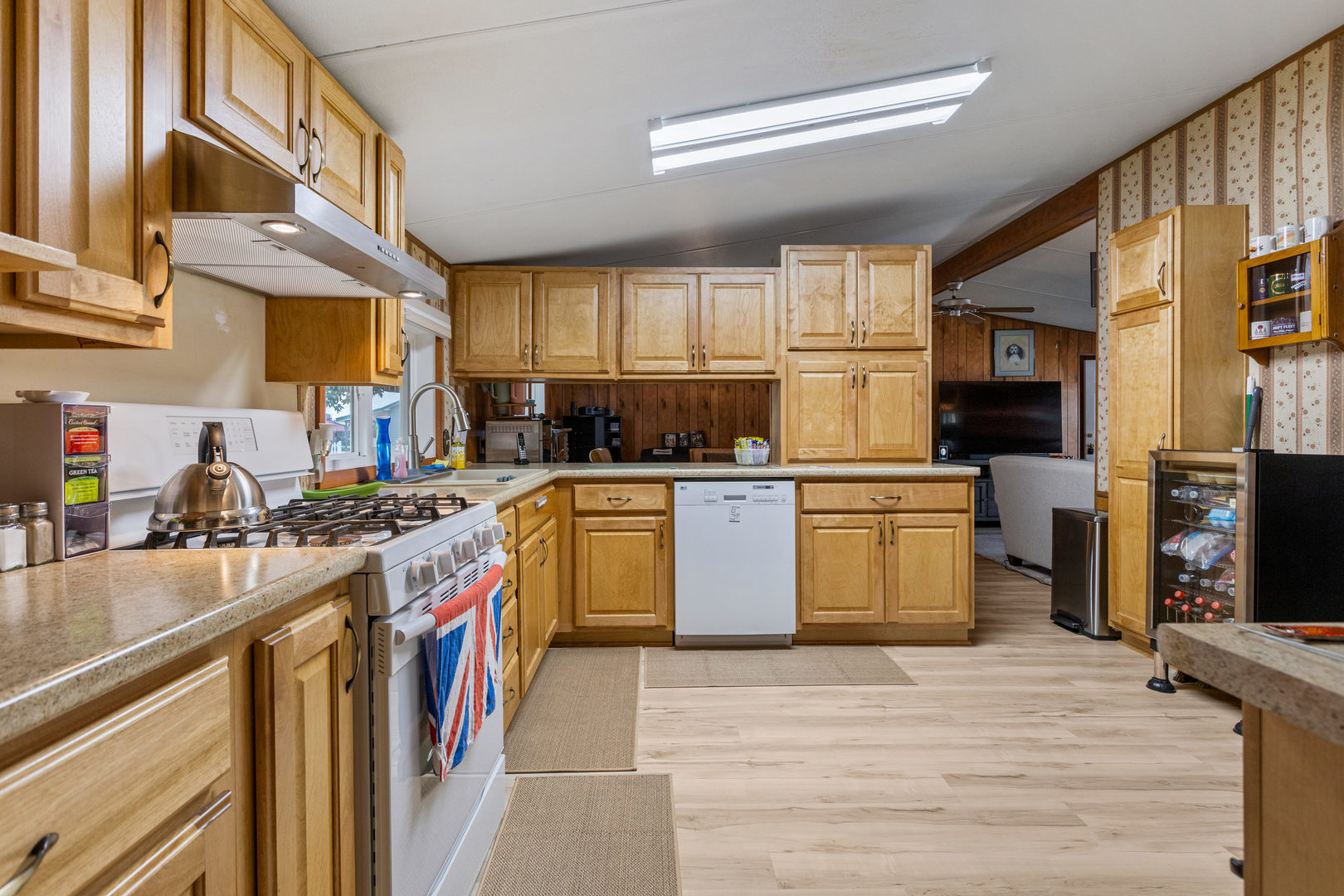 628 Williamson Street Mahomet, IL 61853 - Photo 17 of 36 a kitchen with stainless steel appliances granite countertop a stove a sink dishwasher and a refrigerator