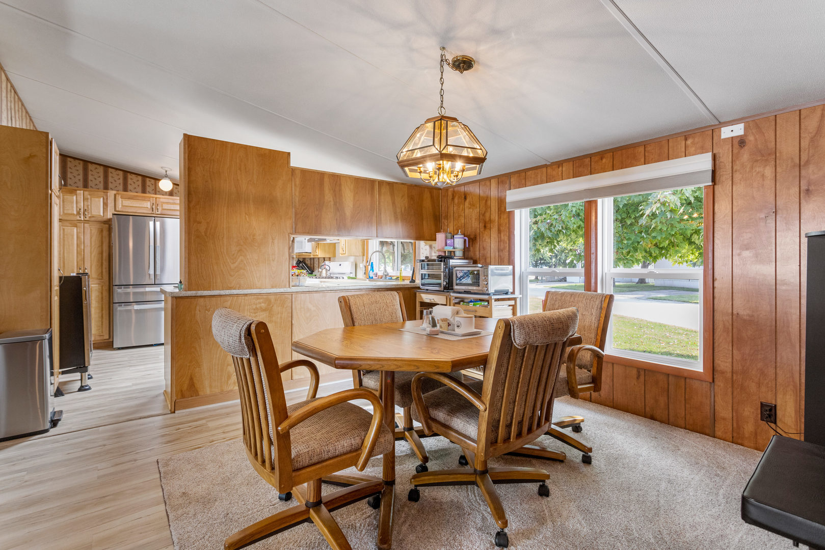 628 Williamson Street Mahomet, IL 61853 - Photo 21 of 36 a view of a dining room with furniture window and outside view