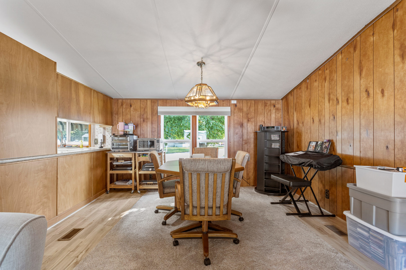 628 Williamson Street Mahomet, IL 61853 - Photo 22 of 36 a view of a dining room with furniture window and outside view