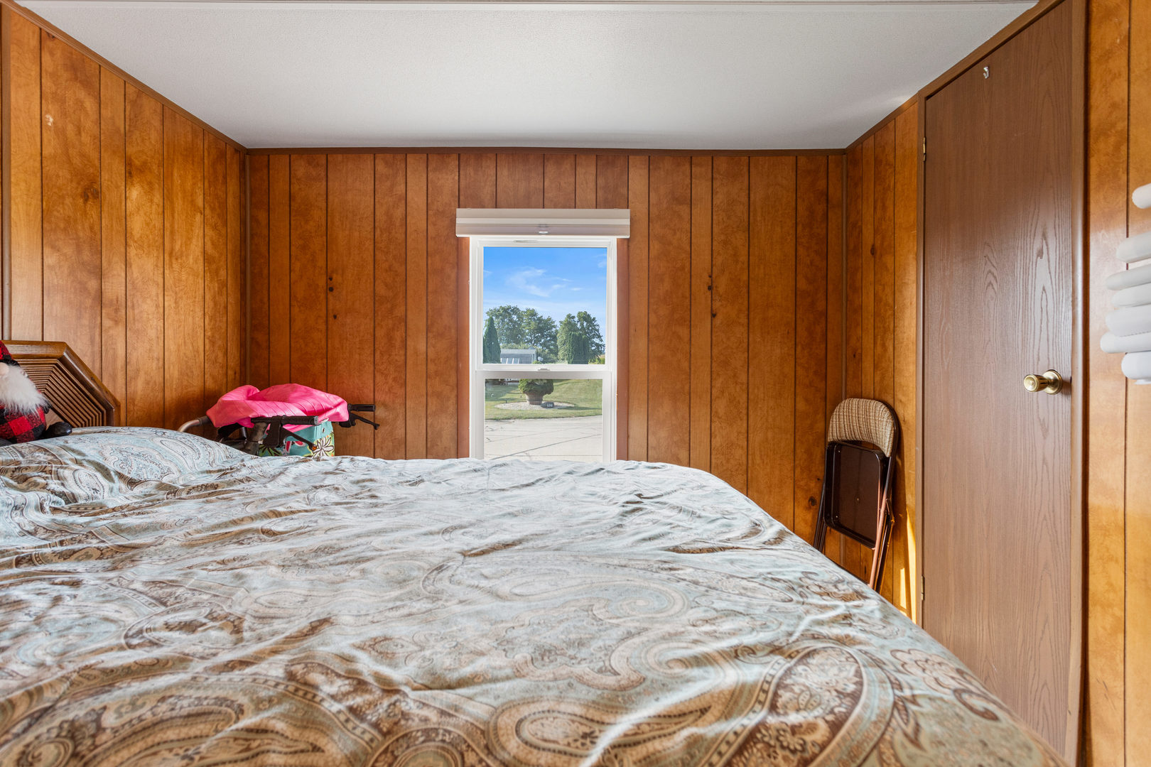 628 Williamson Street Mahomet, IL 61853 - Photo 29 of 36 a bedroom with a bed and a window