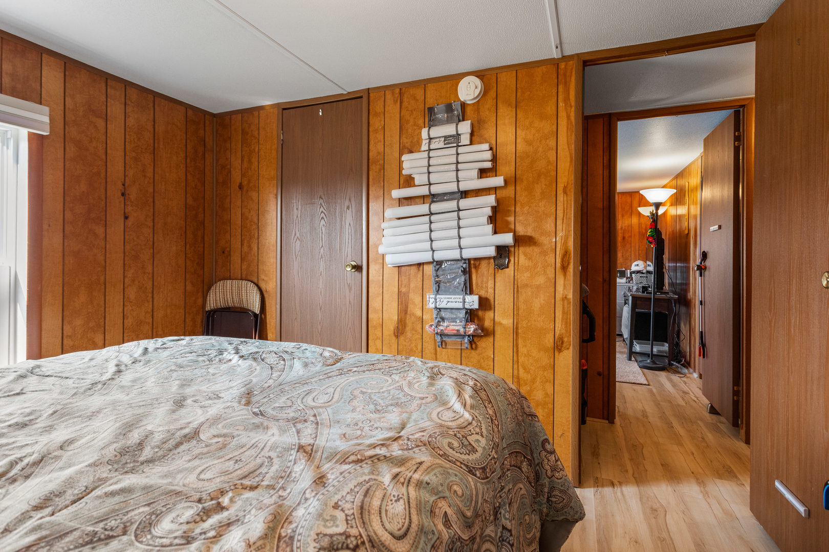 628 Williamson Street Mahomet, IL 61853 - Photo 30 of 36 a bedroom with a bed and a mirror