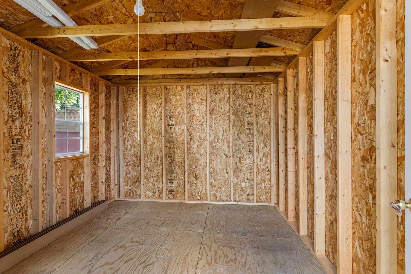 628 Williamson Street Mahomet, IL 61853 - Photo 35 of 36 a view of a room with wooden walls and a window