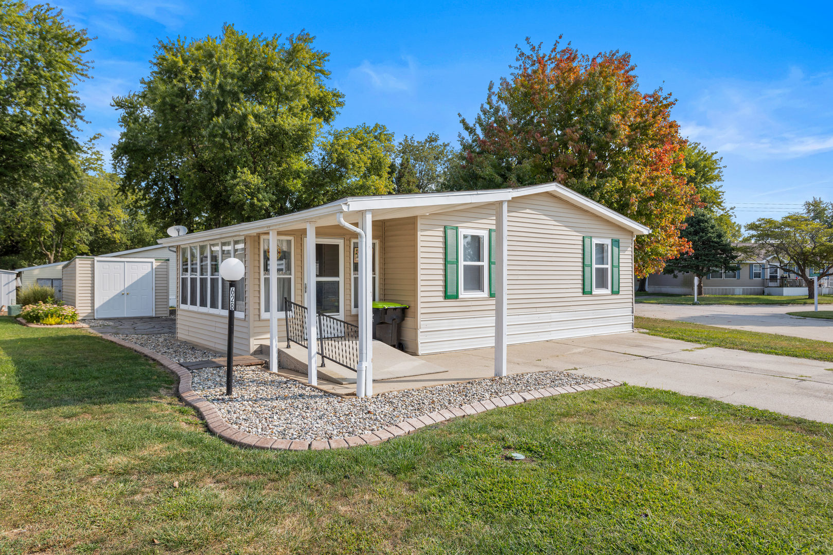 628 Williamson Street Mahomet, IL 61853 - Photo 5 of 36 a view of a house with backyard and trees