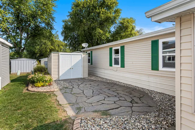 a backyard of a house with lots of green space