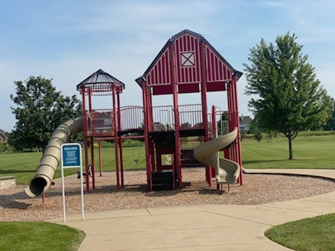 778 Wheatfield Avenue Sugar Grove, IL 60554 - Photo 4 of 8 a view of a house with a yard and slide