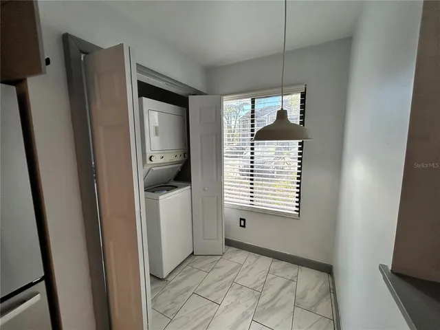 a view of an entryway with a window