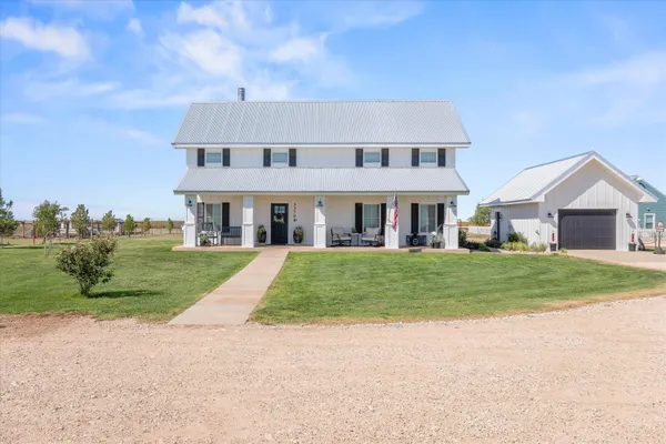 front view of house with a yard