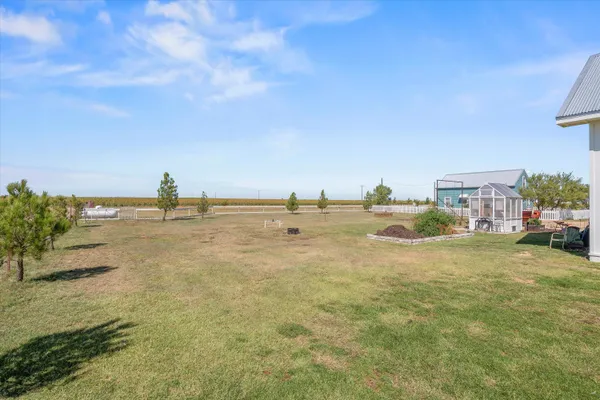 an aerial view of a house with lots of residential buildings