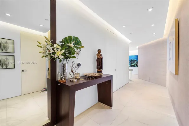 a view of living room with a potted plant