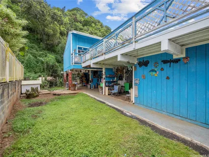 a view of a garage with a table and chairs