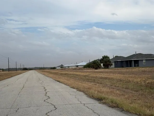 a view of a lake with mountains in the background