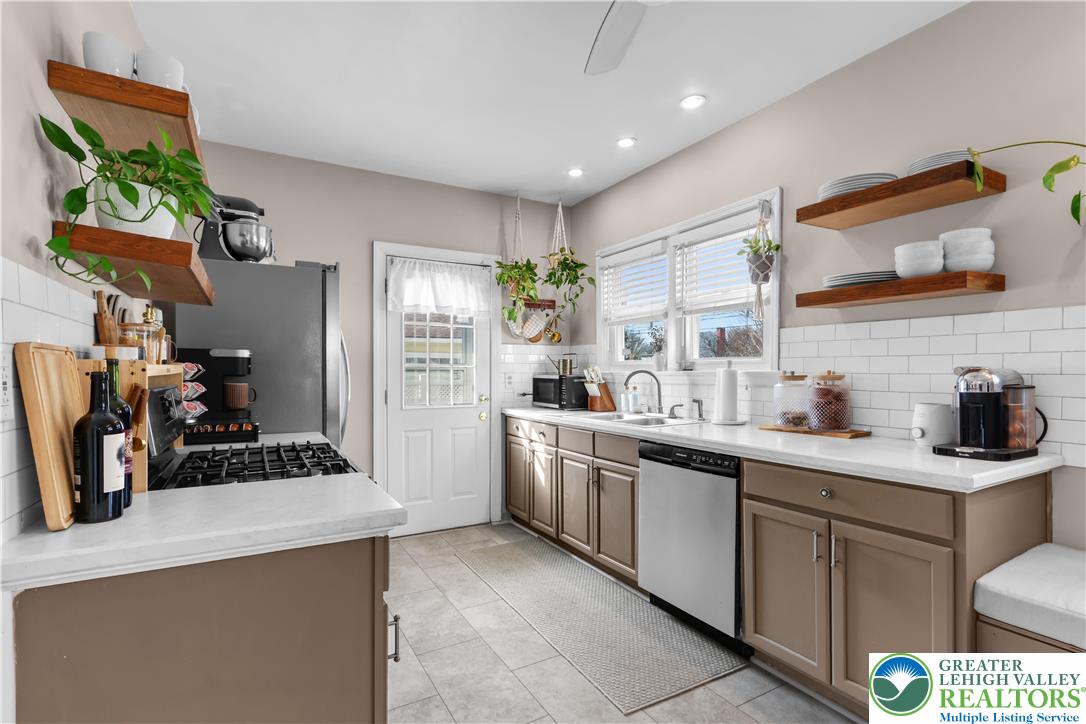 2145 Henderson Street Bethlehem, PA 18017 - Photo 11 of 42 a kitchen with a sink and cabinets