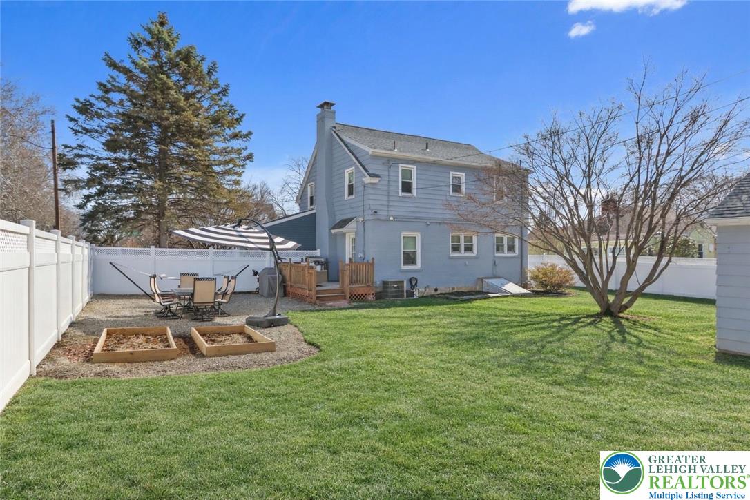 2145 Henderson Street Bethlehem, PA 18017 - Photo 2 of 42 a front view of a house with garden