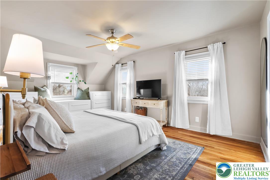 2145 Henderson Street Bethlehem, PA 18017 - Photo 21 of 42 a bedroom with a bed and a flat screen tv