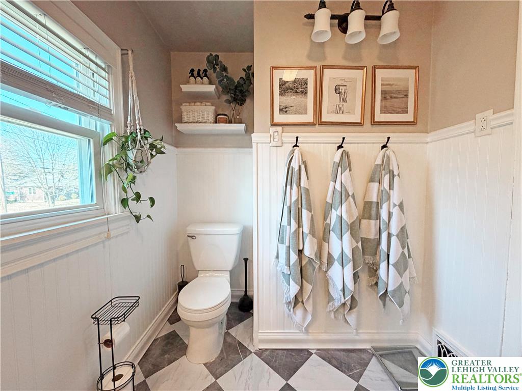 2145 Henderson Street Bethlehem, PA 18017 - Photo 24 of 42 a white toilet sitting next to a window